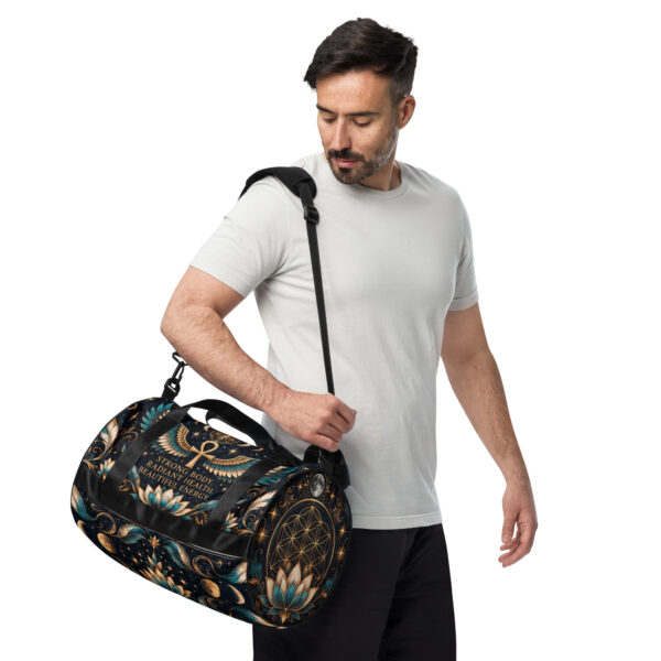all-over-print-gym-bag-white-left-front-6ae36654b5119.jpg Celestial Wing Frequency – Strength & Radiance Gym Bag | Spiritual Affirmation Workout & Travel Duffel Bag